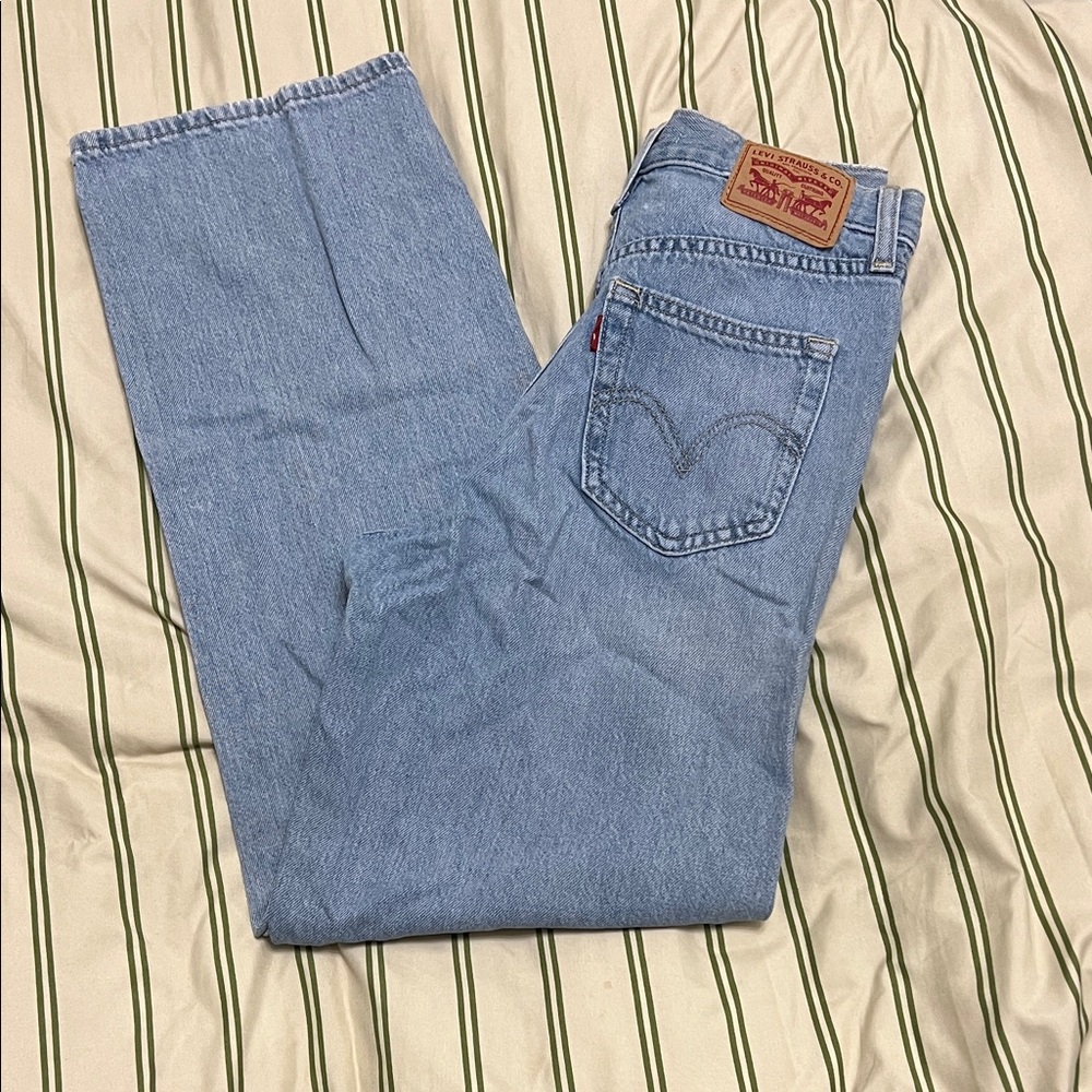 Woman’s Levi’s Straight/Bootcut Blue Jeans
